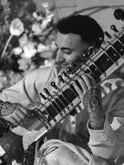 A black and white close-up, focusing on the emotion of the performance.
