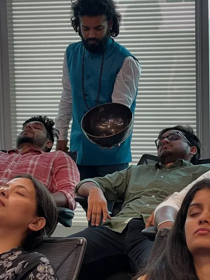 Employees at 7-Eleven taking a moment for themselves. The sound of the singing bowl helps to quiet the mind, making this a powerful midday reset to improve focus and reduce workplace stress.