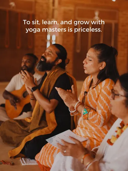 To sit, learn, and grow with yoga masters is a priceless opportunity. Here, students are absorbed in a kirtan session, learning chants that open the heart and connect us to the divine through sound.