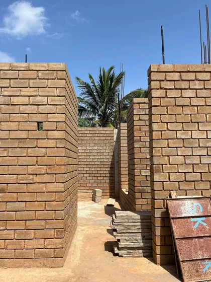 More scenes from our construction sites. These images document the journey of building, from laying rebar and curing concrete to the meticulous work of masonry, all part of bringing a sustainable home to life.