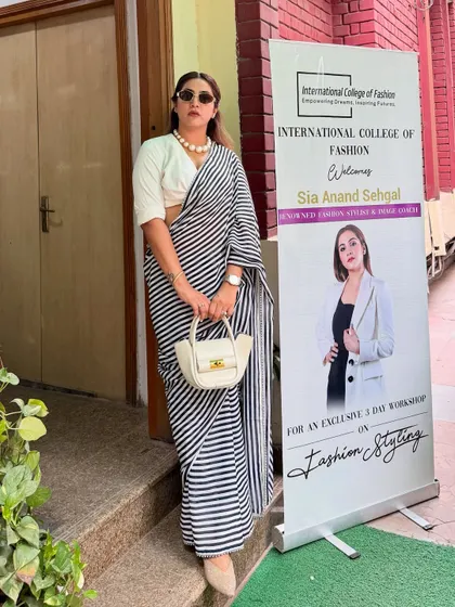 Here I am at the International College of Fashion, ready for day two of my workshop. I restyled this timeless striped saree from my bridal trousseau with a white shirt as a blouse to give it a modern, chic twist.