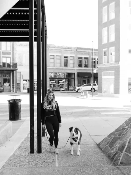 A quiet moment on a walk. Building a strong bond with your dog is the foundation of all successful training.