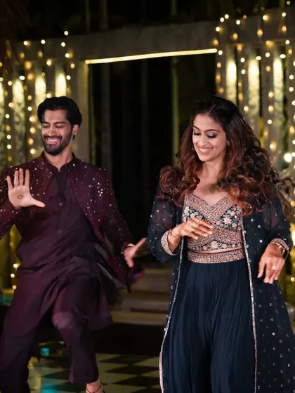 The best moments are often unscripted. We design our spaces to encourage connection and joy, like this Sangeet dance floor where the groom and his sister shared a memorable dance.