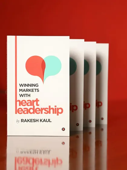 A creative product shot of the book, using reflections to create a visually interesting image for marketing materials.