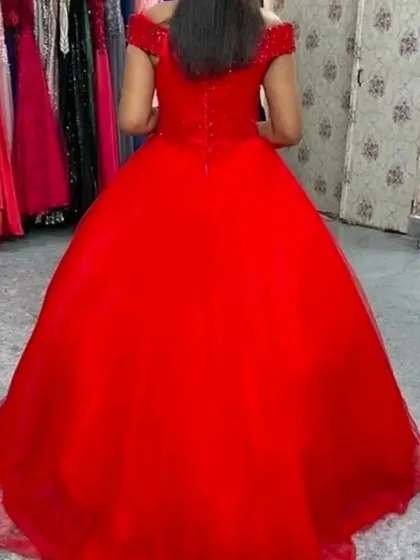 The back view of our red ball gown, showing the corset style lacing.