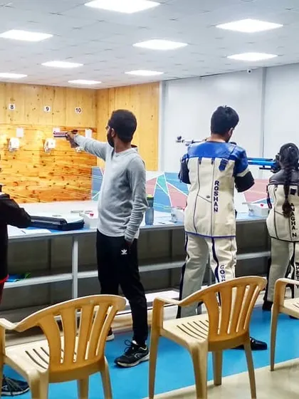 A typical day at our 10-meter range, with guests and members practicing both air rifle and air pistol shooting. You can see a mix of beginners and experienced shooters sharing the space.