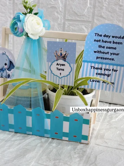 A beautifully composed shot of the blue-themed first birthday return gift, ready to be handed out to party guests.