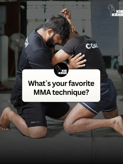 Two members engaged in a grappling session, working on control and submission techniques. We asked our community: what's your favorite MMA technique?