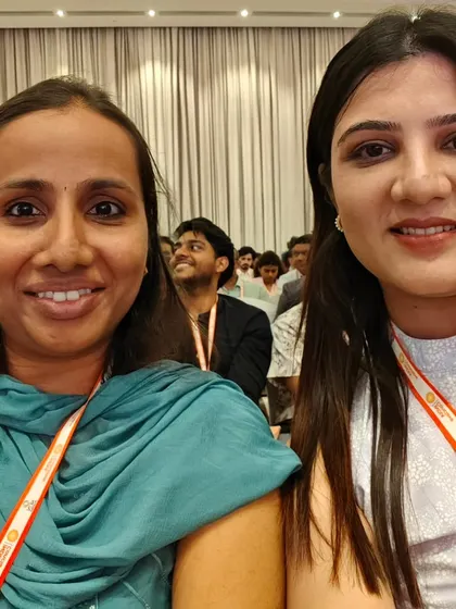 Connecting with fellow dermatologists at a medical conference. These events are vital for staying updated on the latest research and advancements in skincare and cosmetic procedures.