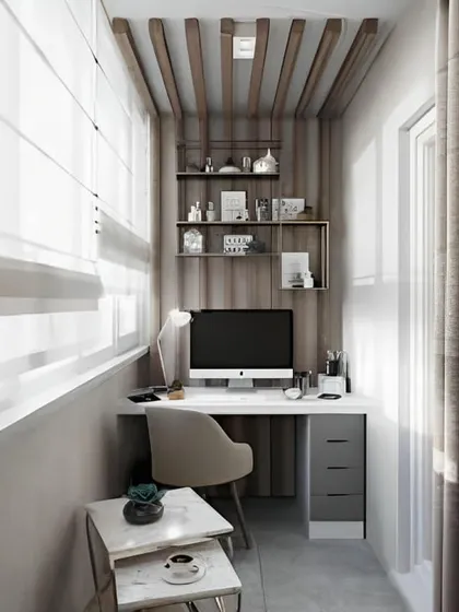 A chic and modern balcony office featuring a sleek desk with grey drawers and a wood-slat ceiling. The design feels sophisticated and professional, perfect for focused work.