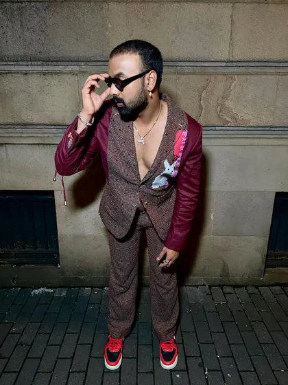 Arshad Ahmed redefines luxury in our Phantasm Suit. The rich maroon linen, coupled with intricate details, strikes the perfect balance between classic and contemporary style.