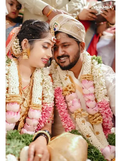 A duplicate of 23, a lovely close up of the couple's intimate moment during the wedding.