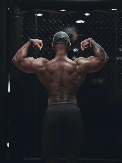 A slightly different angle of the rear double bicep, showing the detail in the lower back and glutes.