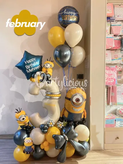 A fun Minions-themed balloon bouquet for a 3rd birthday in February, showing how we can incorporate any character into our designs.