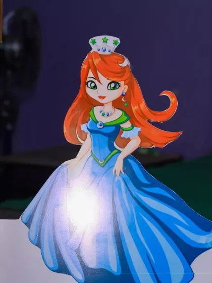 A close-up of a princess character cutout used in one of our first birthday themes. These small, custom elements help bring the party's theme to life for the little ones.