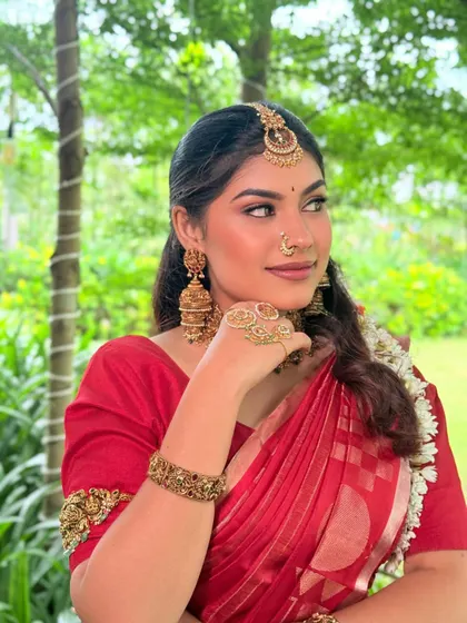 Another angle from the shoot, showing how the makeup looks flawless from every side. The focus is on enhancing the model's natural beauty.