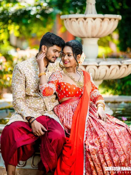 A tender and intimate moment captured by the fountain, showcasing the couple's chemistry.