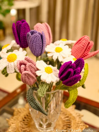 A full and vibrant bouquet of crochet tulips and daisies. This piece is a celebration of colour and craftsmanship.