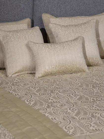 Our soft, breathable beige bed cover, featuring intricate leaf patterns. Its long-lasting colors and easy-care fabric make it a perfect choice for creating a serene and tranquil bedroom haven.