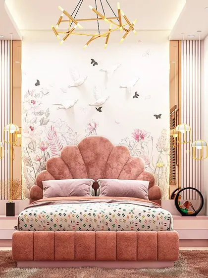 This elegant kids' room features a beautiful shell-shaped upholstered bed in dusty pink. The accent wall is adorned with a delicate floral and bird mural, creating a whimsical and sophisticated space.