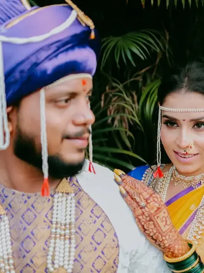 A close-up portrait capturing the loving and playful interaction between the bride and groom.