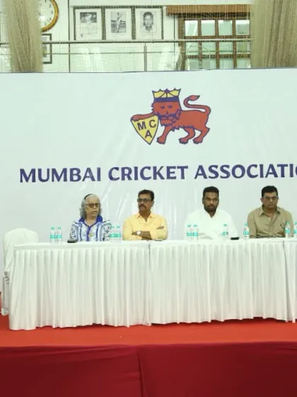 On the dais with other MCA officials, including President Ajinkya Naik and Diana Eduljee, discussing the roadmap for the upcoming season.