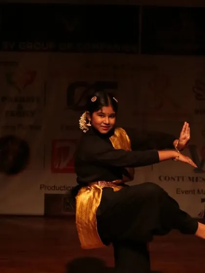 A dynamic pose from a young classical dancer at our showcase.