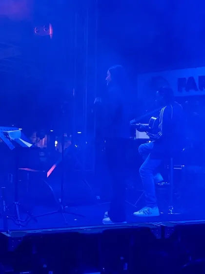 A moody, blue-lit shot from our opening set for Armaan Malik. The atmosphere was electric and it felt amazing to perform on such a grand stage.