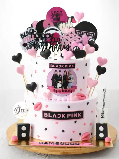 The K-pop fever is real. This two-tier Blackpink-themed cake is perfect for a Blink, decorated with band logos, hearts, and images of the group.