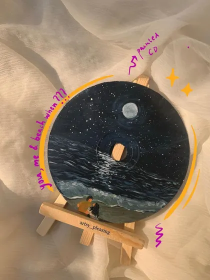 "You, me & beach when???" A romantic beach scene at night, painted on an upcycled CD.