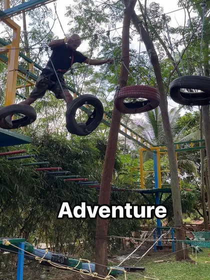 A guest tackles the tire obstacle on one of our rope courses. These games are designed to be fun, challenging, and a great workout.