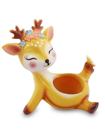 Another look at our cheerful deer pot, perfect for holding a mini succulent or air plant. It's a wonderful decorative piece for a child's room or a nature lover's desk.