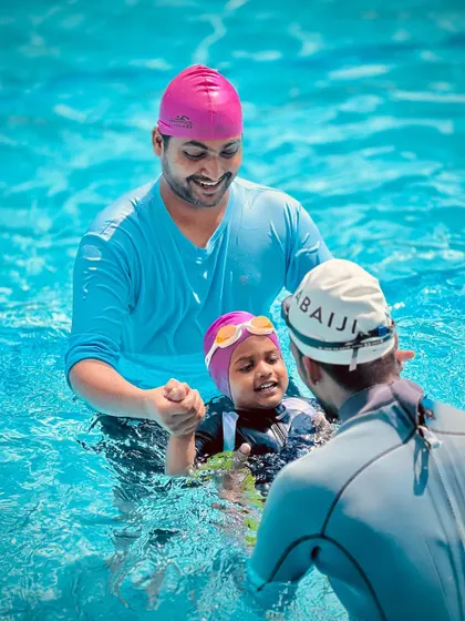Our coaches work closely with each child, offering encouragement and a steady hand. This interaction is crucial for building confidence in our infant and toddler swim classes.