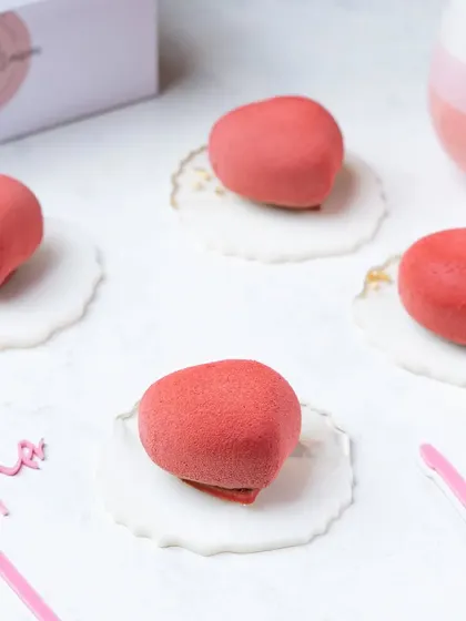 Heart-shaped petit gateaux with a soft, velvety texture. We use lighting to emphasize unique textures and finishes on gourmet desserts.
