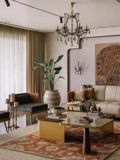 The color palette for this living room was all about celebrating minimalism with warm, earthy tones from the traditional Indian palette. The custom-painted Kalamkari art, leather sofa, and 'velaku' inspired side table come together to create a cozy, sophisticated space.