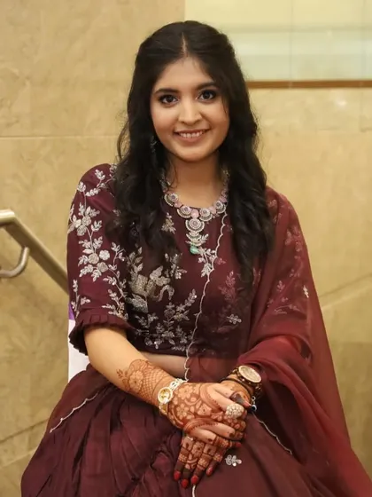 The complete look, showing how the makeup, hair, and outfit come together for a perfect engagement ceremony.