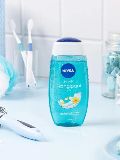 A bathroom shelf scene styled for Nivea's Frangipani shower gel. I used a monochromatic blue color palette and bathroom props to create a realistic, in-context visual that feels both clean and refreshing.