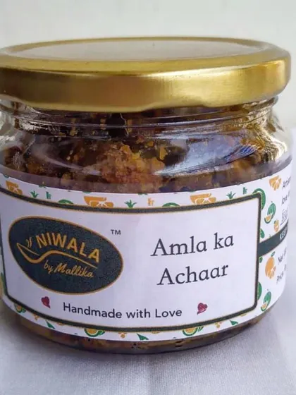 A fresh jar of my Amla ka Achaar, made with Indian gooseberry, green chili, ginger, and jaggery. It is a lip-smacking pickle that is both healthy and incredibly tasty.