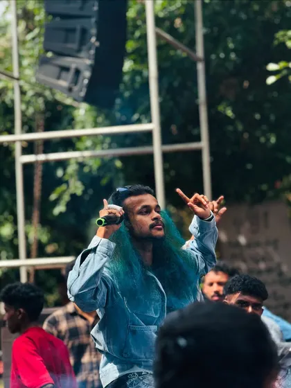 Hyping up the crowd during a freshers' party. My goal is to make their first college party an unforgettable one.