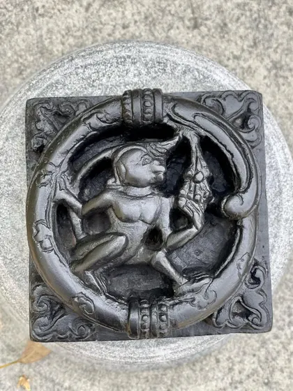 Another view of our monkey and grapes plaque, a unique piece of decor carefully carved by an artist in Karnataka.