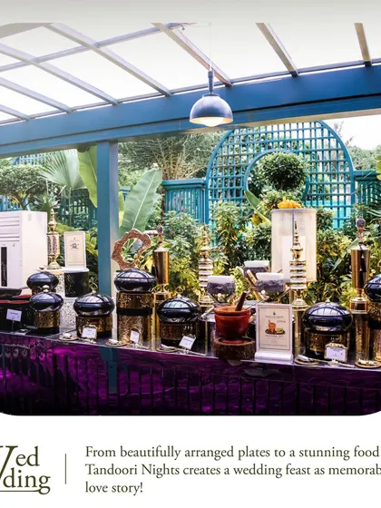 An outdoor wedding setup showcasing our ability to create a stunning dining experience in any location. The elegant arrangement of our serving dishes against a lush green backdrop makes for a memorable feast.