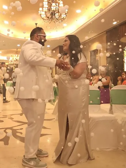 A magical entry for the couple, surrounded by bubbles that look like floating pearls.