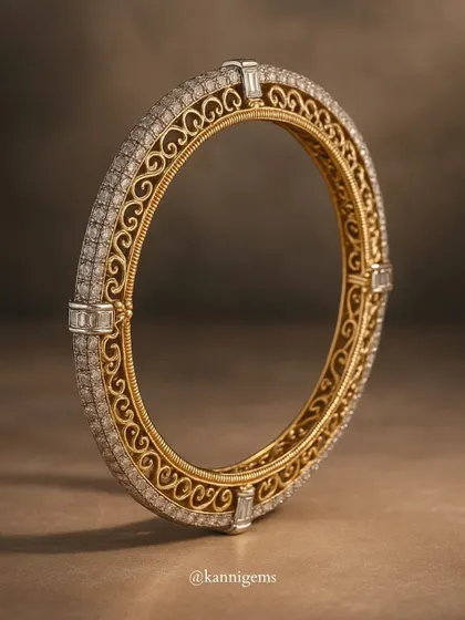 A detailed look at the craftsmanship of this filigree and diamond bangle. The swirling gold patterns are a testament to the skill of my artisans.