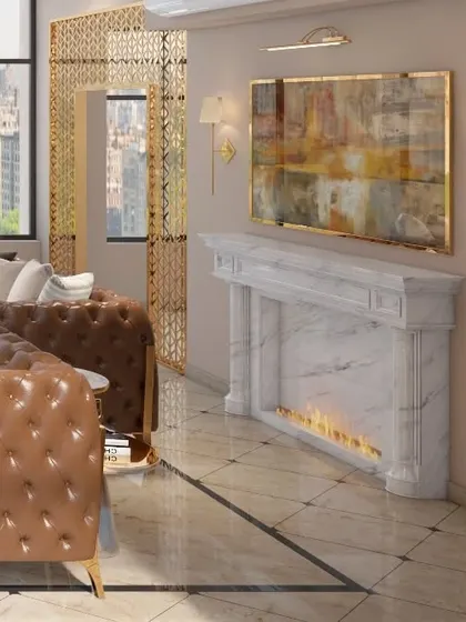 A detail of the lounge, showing a modern electric fireplace set in a carved marble mantelpiece. This element adds a touch of classic warmth and serves as a sophisticated focal point.