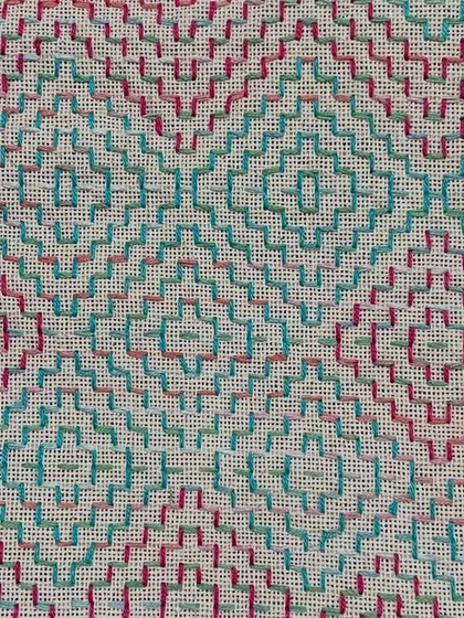 A close-up of the geometric pattern. The joy and peace that come from doing hand embroidery are immense, no matter what you call the stitch.