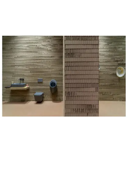 Another view of the stall's interior, showing how different bathroom products are arranged in distinct zones. The design is both aesthetically compelling and highly functional as a product showcase.