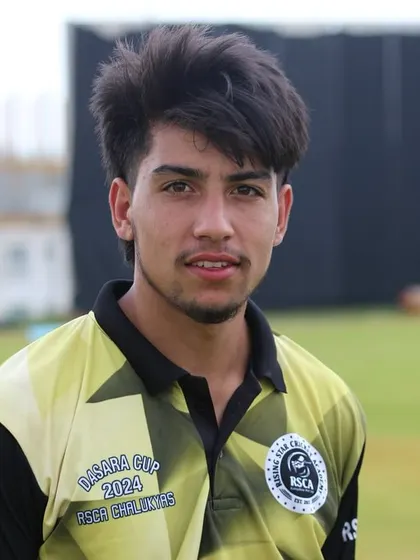 A portrait of a young, determined player at the Dasara Cup.