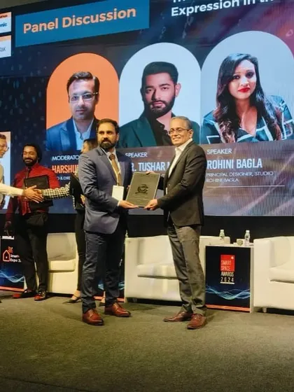 A duplicate of image 33, this photo shows our Managing Director participating in the awards ceremony at the Smart Home Expo, reinforcing our commitment to the industry community.