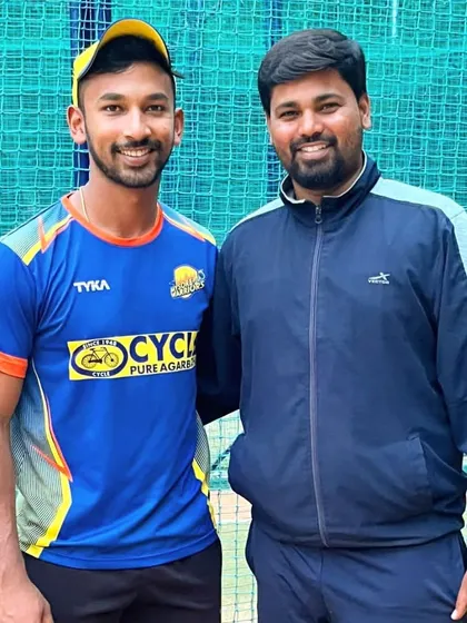 Our head coach with our star alumnus Aditya Mani. This picture represents the long-term mentorship and guidance we provide to our players, even after they turn professional.