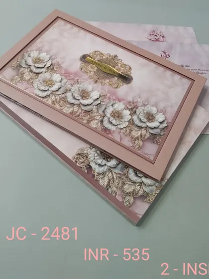 A beautiful framed invitation with 3D flowers in dusty rose and gold. The soft, romantic design and premium finish make it a perfect choice for an elegant wedding.